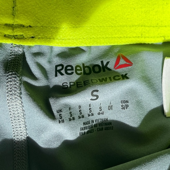 Reebok exercise short with peak-a-boo shorts underneath for extra coverage! - Picture 3 of 4